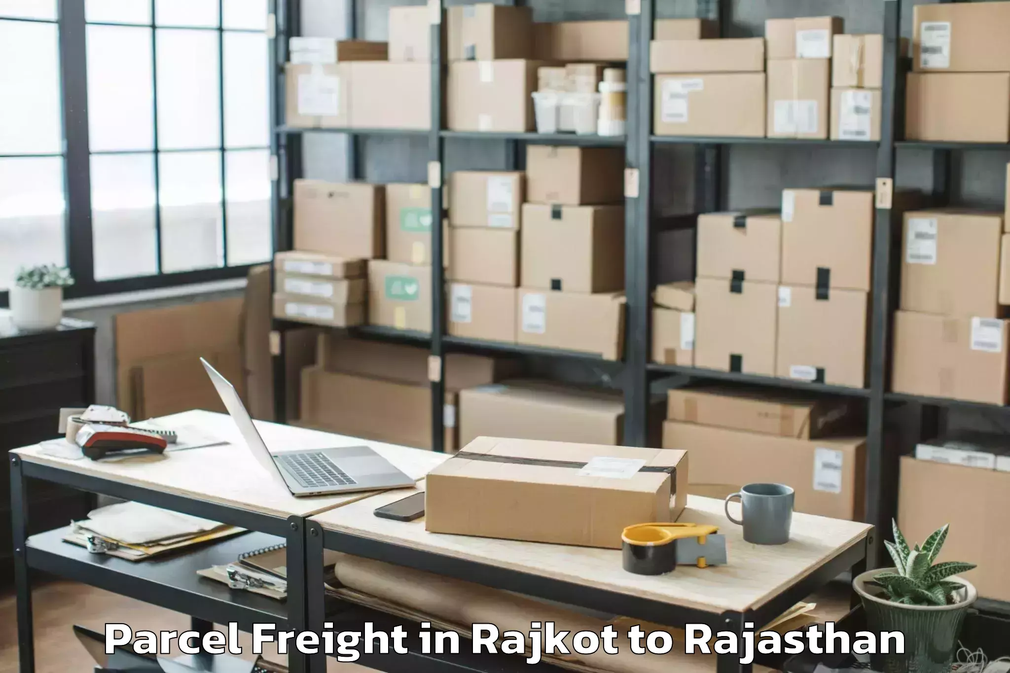 Book Rajkot to Indergarh Parcel Freight